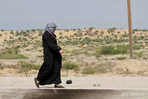 A Palestinian protestor runs during clashes with Israeli security forces near the Erez border crossing between Israel and northern Gaza Strip on October 13, 2015. A wave of stabbings that hit Israel, Jerusalem and the We...