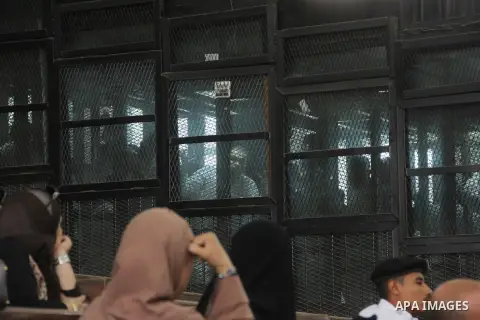 Suspects of Ansar Bait Al-Maqdis group, attend their trial in Cairo on Oct. 13, 2015, on charges of assassination of police officers, attempted assassination of interior minister Mohamed Ibrahim and explosions near secur...