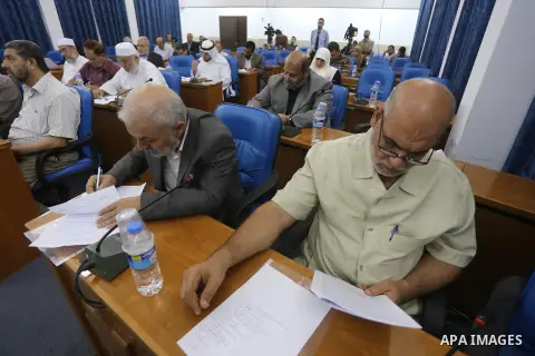 Members of the Palestinian legislative council from Hamas movement attend a meeting at the legislative council in Gaza city on Oct. 14, 2015. Photo by Mohammed Asad