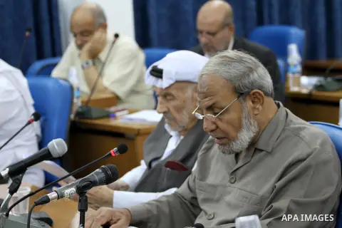 Members of the Palestinian legislative council from Hamas movement attend a meeting at the legislative council in Gaza city on Oct. 14, 2015. Photo by Mohammed Asad