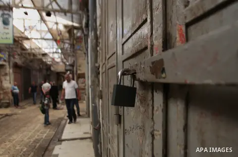 A general view shows closed shops at a market in the West Bank city of Nablus during a general strike in solidarity with the ongoing clashes surrounding access to Jerusalem's Al-Aqsa mosque compound on October 14, 2015....