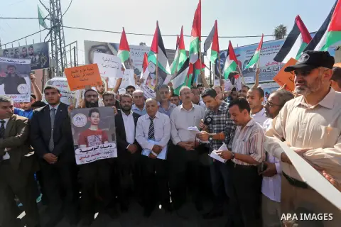 Palestinians shout slogans during an anti-Israel protest in Gaza city, on October 15, 2015. Amid violent protests and a wave of stabbings spreading fear in Israel and warnings that a full-scale uprising could erupt, a ne...