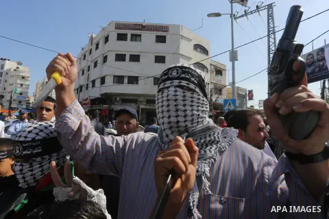 Palestinians shout slogans during an anti-Israel protest in Gaza city, on October 15, 2015. Amid violent protests and a wave of stabbings spreading fear in Israel and warnings that a full-scale uprising could erupt, a ne...