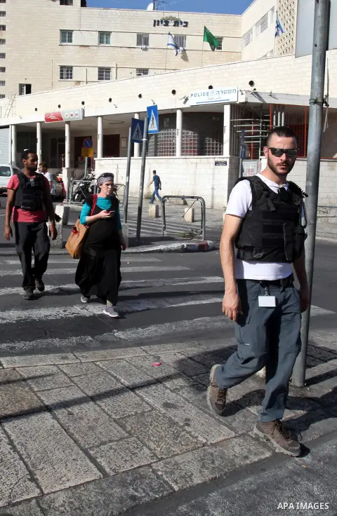 Israeli police stand guard in Jerusalem's Old city on October 15, 2015. Seven Israelis and 30 Palestinians, including children and assailants, have been killed in two weeks of bloodshed in Israel, Jerusalem and the occup...