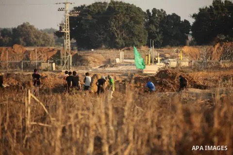 Palestinian protesters clash with Israeli troops near the border between Israel and central Gaza Strip October 15, 2015. Thirty-two Palestinians and seven Israelis have been killed in the past two weeks of bloodshed. The...