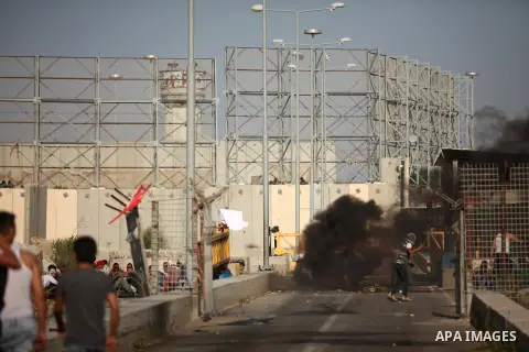 Palestinian protesters clash with Israeli security forces at the Erez crossing checkpoint in the northern Gaza Strip October 16, 2015. The unrest that has engulfed Jerusalem and the occupied West Bank, the most serious i...