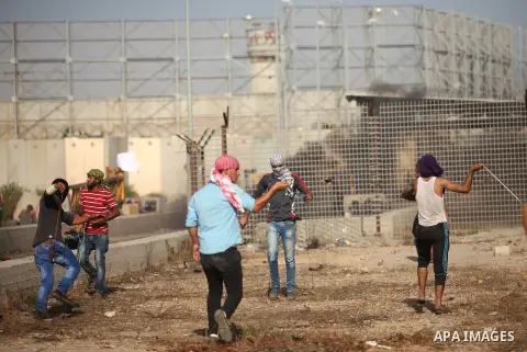 Palestinian protesters clash with Israeli security forces at the Erez crossing checkpoint in the northern Gaza Strip October 16, 2015. The unrest that has engulfed Jerusalem and the occupied West Bank, the most serious i...