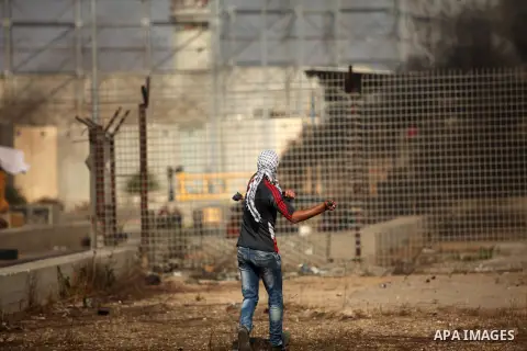 Palestinian protesters clash with Israeli security forces at the Erez crossing checkpoint in the northern Gaza Strip October 16, 2015. The unrest that has engulfed Jerusalem and the occupied West Bank, the most serious i...