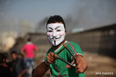 Palestinian protesters clash with Israeli security forces at the Erez crossing checkpoint in the northern Gaza Strip October 16, 2015. The unrest that has engulfed Jerusalem and the occupied West Bank, the most serious i...
