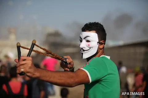Palestinian protesters clash with Israeli security forces at the Erez crossing checkpoint in the northern Gaza Strip October 16, 2015. The unrest that has engulfed Jerusalem and the occupied West Bank, the most serious i...