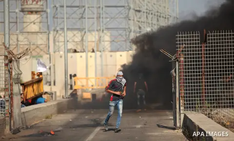 Palestinian protesters clash with Israeli security forces at the Erez crossing checkpoint in the northern Gaza Strip October 16, 2015. The unrest that has engulfed Jerusalem and the occupied West Bank, the most serious i...