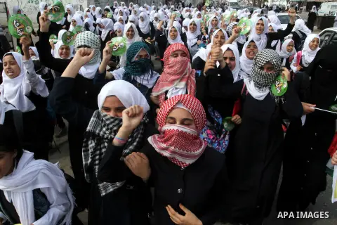 Palestinian school girls take part in an anti-Israel protest in Khan Younis in the southern in Gaza strip, on Oct. 18, 2015. Israel pressed ahead with major security measures after five more stabbing incidents, while ult...