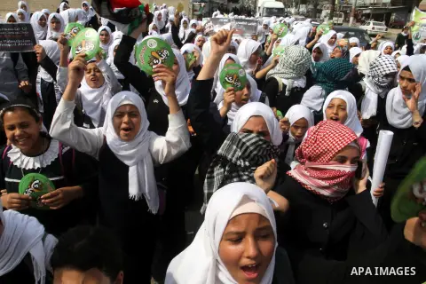 Palestinian school girls take part in an anti-Israel protest in Khan Younis in the southern in Gaza strip, on Oct. 18, 2015. Israel pressed ahead with major security measures after five more stabbing incidents, while ult...