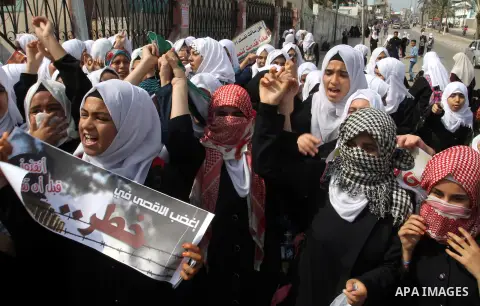 Palestinian school girls take part in an anti-Israel protest in Khan Younis in the southern in Gaza strip, on Oct. 18, 2015. Israel pressed ahead with major security measures after five more stabbing incidents, while ult...