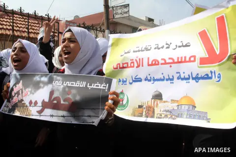 Palestinian school girls take part in an anti-Israel protest in Khan Younis in the southern in Gaza strip, on Oct. 18, 2015. Israel pressed ahead with major security measures after five more stabbing incidents, while ult...