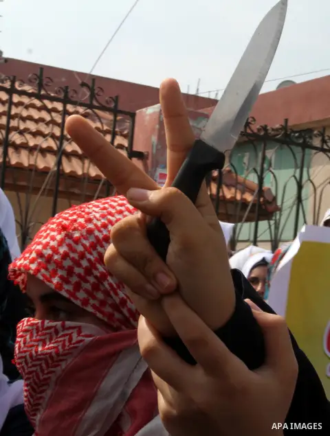 Palestinian school girls take part in an anti-Israel protest in Khan Younis in the southern in Gaza strip, on Oct. 18, 2015. Israel pressed ahead with major security measures after five more stabbing incidents, while ult...