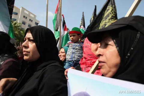 Palestinian women supporting the Islamic Jihad movement take part in a rally in Gaza City to show solidarity with Palestinians confronting Israelis in the West Bank and Jerusalem October 20, 2015. Photo by Ashraf Amra