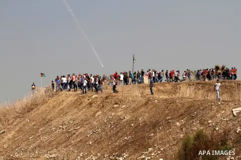 Palestinian protesters throw stones at Israeli security forces during clashes in the West Bank town of Tulkarm, October 20, 2015. Triggered by Israeli incursions into the Al-Aqsa Mosque compound last month, violence and...