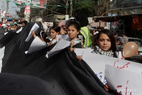 Palestinian students take part in a protest to show solidarity with Al-Aqsa Mosque compound and Palestinians in west Bank in Rafah in the southern Gaza srtip on Oct. 22, 2015. violence and protests against Israel's occup...