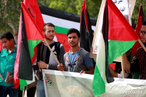 Palestinian supporters of Palestinian People's Party take part in an anti-Israeli protest, in Gaza city on October 22, 2015. Violence and protests against Israel's occupation have increased in frequency across the West B...
