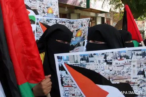Palestinian women take part in an anti-Israeli protest in Rafah in the southern Gaza Strip, October 26, 2015. Clashes between Palestinians and Israeli forces erupted at Jerusalem's Al-Aqsa mosque compound in September as...