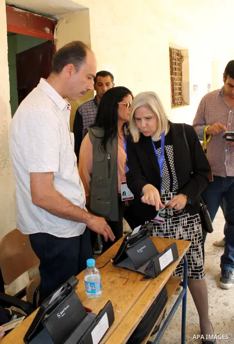 Haifa Abu Ghazaleh President of the Arab League mission to follow up the parliamentary elections in Egypt, inspects a polling center, in Cairo on October 27, 2015. Turnout for the first round of voting held in 14 of Egyp...