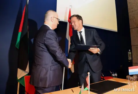 Palestinian Prime Minister Rami Hamdallah shakes hands with his Dutch counterpart Mark Rutte, after signing a cooperation agreement in Catshuis in The Hague, The Netherlands, 29 October 2015. The leaders met on the occas...