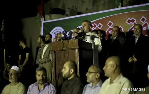 Palestinian supporters of Hamas and Islamic Jihad movements take part in an anti-Israel protest in Gaza city on November 3, 2015. Photo by Mohammed Talatene