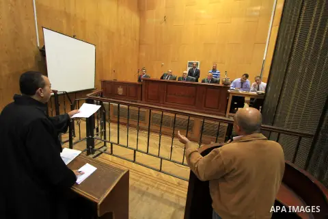 The Judges attend the trial of Egyptian defendants over a 2012 stadium riot in the canal city of Port Said at the police academy on the outskirts of the capital Cairo on Nov. 14, 2015. Photo by Amr Sayed