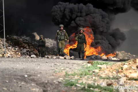 Palestinian protesters take part in clashes with Israeli security forces in the West Bank village of Kafr Qaddum, near the northern city of Nablus, November 27, 2015. The current wave of violence erupted in mid-September...