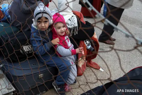 Palestinians wait for permission to enter Egypt at the Rafah border crossing in the southern Gaza Strip, on December 3, 2015. Egypt is due to re-open its Rafah border crossing with the Palestinian coastal enclave for two...