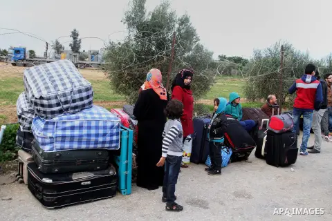 Palestinians wait for permission to enter Egypt at the Rafah border crossing in the southern Gaza Strip, on December 3, 2015. Egypt is due to re-open its Rafah border crossing with the Palestinian coastal enclave for two...