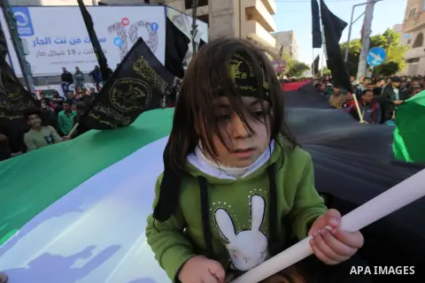 Palestinian supporters of Islamic Jihad movement take part during a protest to show solidarity with Al-Aqsa mosque and Palestinians in the West Bank occupied, in Gaza city on Dec. 04, 2015. Photo by Mohammed Asad