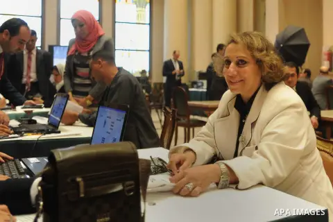 Newly members of the Egyptian Representatives council extract of their identity cards for Representatives council in Cairo, Egypt, on Dec. 09, 2015. Photo by Stranger
