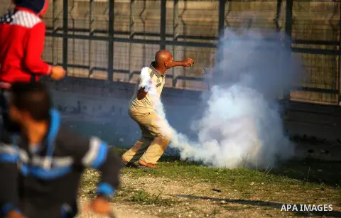 Palestinian protesters clash with Israeli security forces at the Erez crossing checkpoint in the northern Gaza Strip on Dec. 11, 2015. A Palestinian was shot dead and 12 wounded in clashes with Israeli forces on the bord...