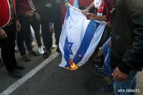 Palestinian protesters clash with Israeli security forces at the Erez crossing checkpoint in the northern Gaza Strip on Dec. 11, 2015. A Palestinian was shot dead and 12 wounded in clashes with Israeli forces on the bord...