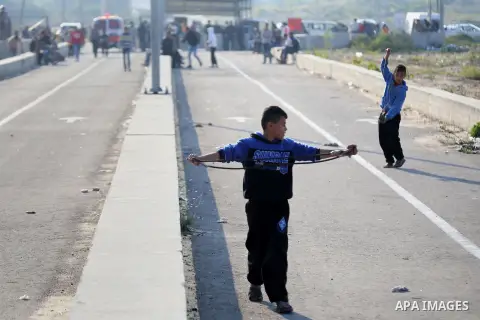 Palestinian protesters clash with Israeli security forces at the Erez crossing checkpoint in the northern Gaza Strip on Dec. 11, 2015. A Palestinian was shot dead and 12 wounded in clashes with Israeli forces on the bord...