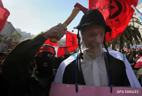 Palestinians take part in a demonstration marking the 48th anniversary of the Popular Front for the Liberation of Palestine (PFLP), in the West bank city of nablus, Saturday, Dec. 12, 2015. The PFLP is a hard-line Palest...