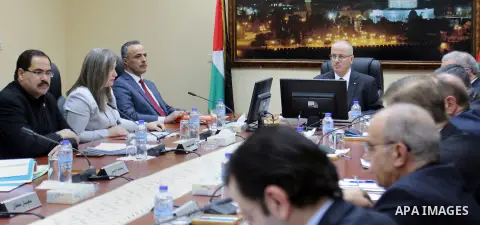 Palestinian Prime Minister, Rami Hamdallah, chairs a meeting of council ministers, in the West Bank city, on Dec. 15, 2015. Photo by Prime Minister Office