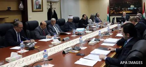 Palestinian Prime Minister, Rami Hamdallah, chairs a meeting of council ministers, in the West Bank city, on Dec. 15, 2015. Photo by Prime Minister Office