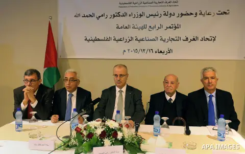 Palestinian Prime Minister, Rami hamdallah, attend a press conference, in the West Bank city of Ramallah, on Dec. 16, 2015. Photo by Prime Minister Office