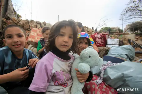 Palestinians inspect the home of the Ibrahim Diab and his daughter Dina was demolished by the Israeli military in the Sheikh Jarrah neighborhood of occupied East Jerusalem on Dec. 16, 2015. The home was 85 square meters...