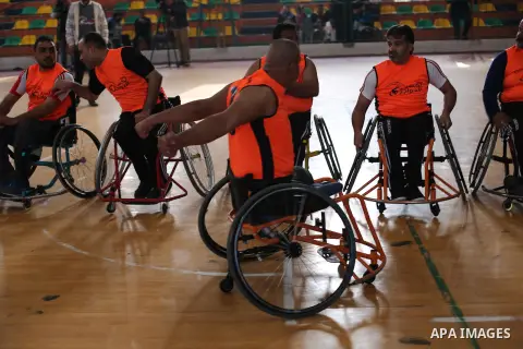 Disabled Palestinians take part in a local wheelchair basketball championship sponsored by the International Committee of the Red Cross (ICRC) in Gaza City December 17, 2015. Photo by Mohammed Asad