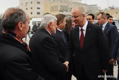 Palestinian Prime Minister, Rami Hamdallah, opens the main water pipeline project, in the West Bank city of Hebron, on December 17, 2015. Photo by Prime Minister Office