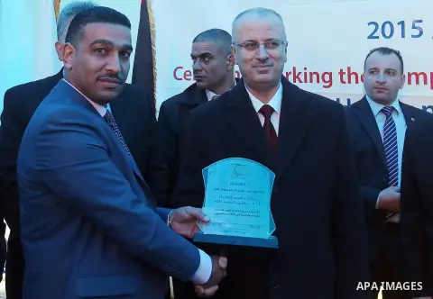 Palestinian Prime Minister, Rami Hamdallah, opens the main water pipeline project, in the West Bank city of Hebron, on December 17, 2015. Photo by Prime Minister Office