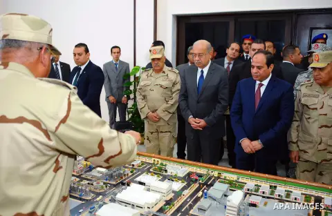 Egyptian President Abdel Fattah al-Sisi, opens Mono and adenosine triphosphate factory at El-Fayoum governorate, Egypt, on December 17, 2015. Photo by Egyptian President Office