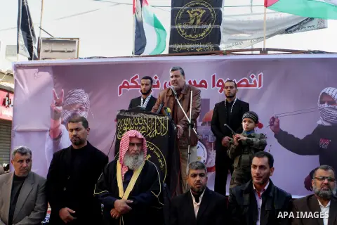Palestinian Islamic Jihad militants take part in an anti-Israel rally in the town of Rafah in the southern Gaza Strip on December 18, 2015. A wave of violence has hit the Palestinian Territories, Jerusalem and Israel sin...