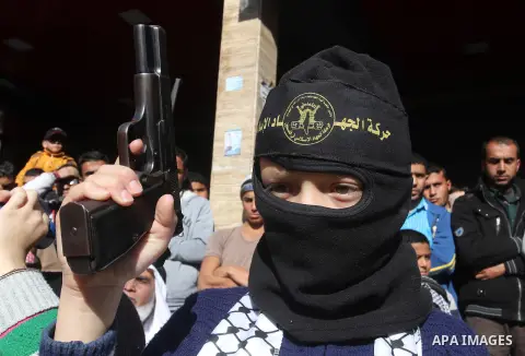 Palestinian Islamic Jihad militants take part in an anti-Israel rally in the town of Rafah in the southern Gaza Strip on December 18, 2015. A wave of violence has hit the Palestinian Territories, Jerusalem and Israel sin...