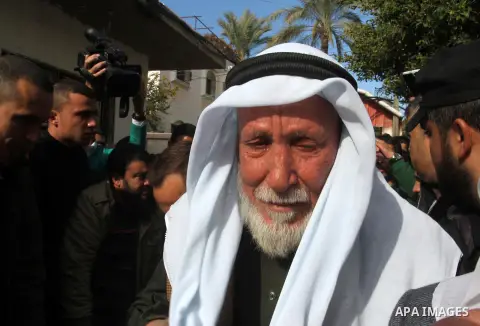Relatives of Palestinian Mahmoud Al-Aga, 20, whom medics said was killed by Israeli troops during clashes with Palestinian protesters on Friday, mourn during his funeral in Khan Younis in the southern of Gaza Strip Decem...