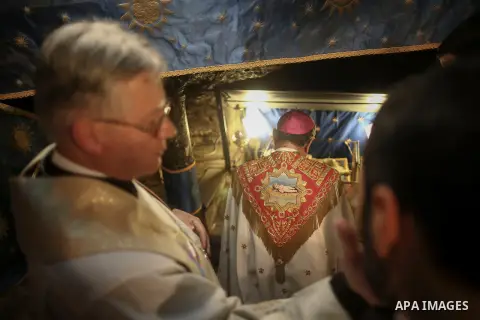 The Latin Patriarch of Jerusalem, Fouad Twal leads a Christmas Midnight Mass at the Church of the Nativity in the town of Bethlehem, the West Bank, 25 December 2015. APAIMAGES/FADI AROURI/POOL